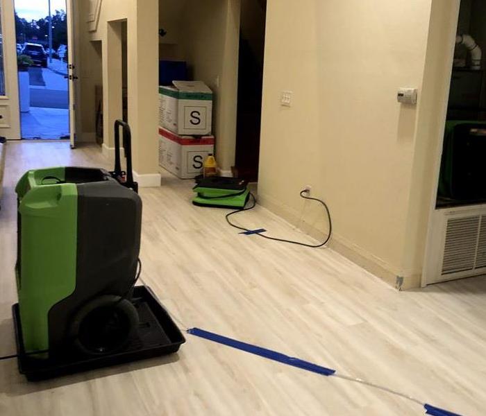 hallway with drying equipment 