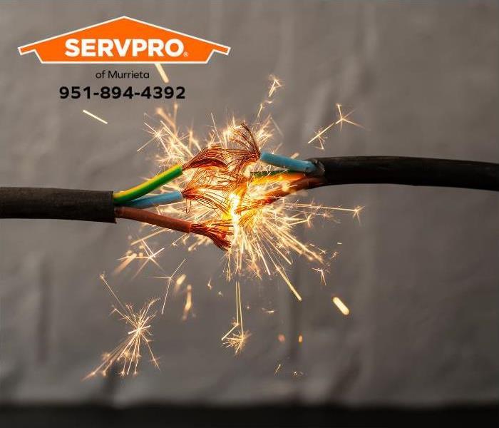 A damaged electric cord sends sparks flying.